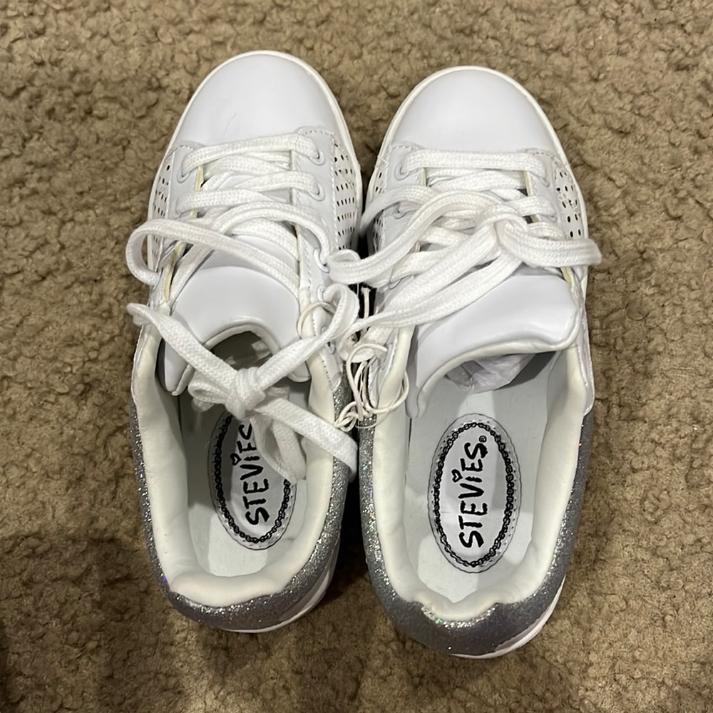 Stevie’s: white sneakers